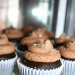 Chocolate Devils Food Cupcake filled with Vanilla scented cream and Heath Bar and topped with Milk Chocolate Buttercream Frosting